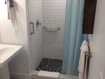 Tiled step in shower bathroom